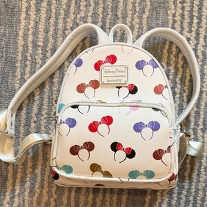 Loungefly White Backpack with Colorful Bow Patterns